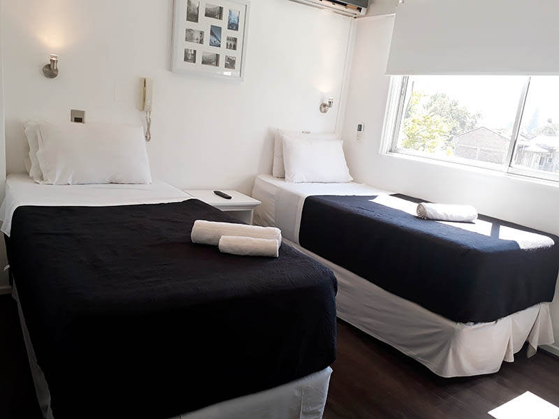 Habitaciones del Hotel Boutique Tremo Patio Bellavista en Santiago de