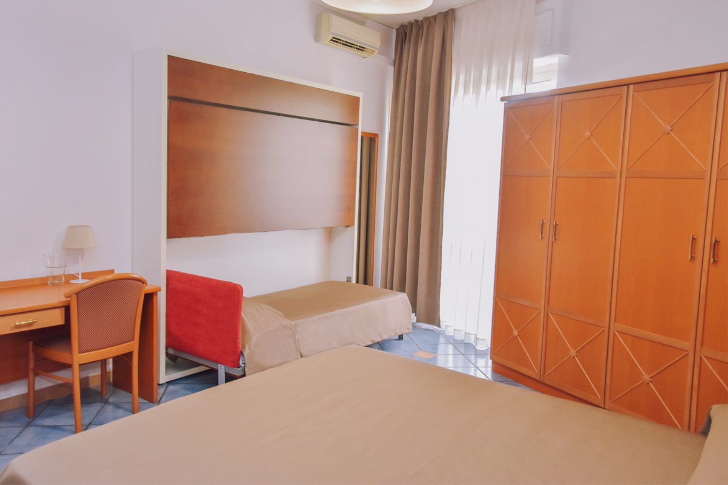 Galería del Hotel Il Piccolo Sogno en Pompei.  Oficial.